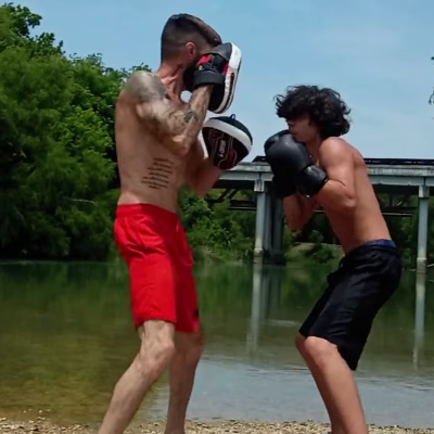 training outside with the mitts hands on private boxing training in Luling